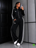 Black Iconic Flow Suit